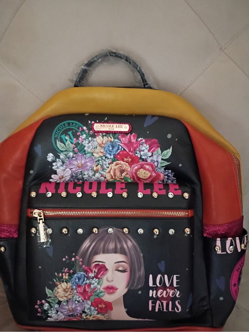 Nicole Lee Black Floral 'Love Never Fails' Multicolor Accent Backpack